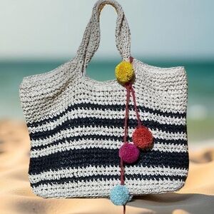 Woven medium/large Straw Tote with round brightly colored Pom Pom’s! BOHO DREAM